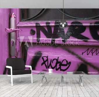 Picture of Purple door detail with black graffity